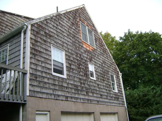 Siding before — weathered cedar shake